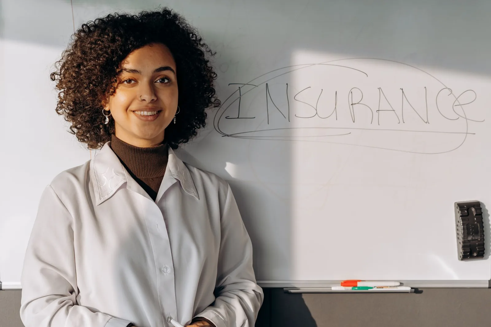 best travel insurance companies — a traveler reviewing insurance paperwork before a trip