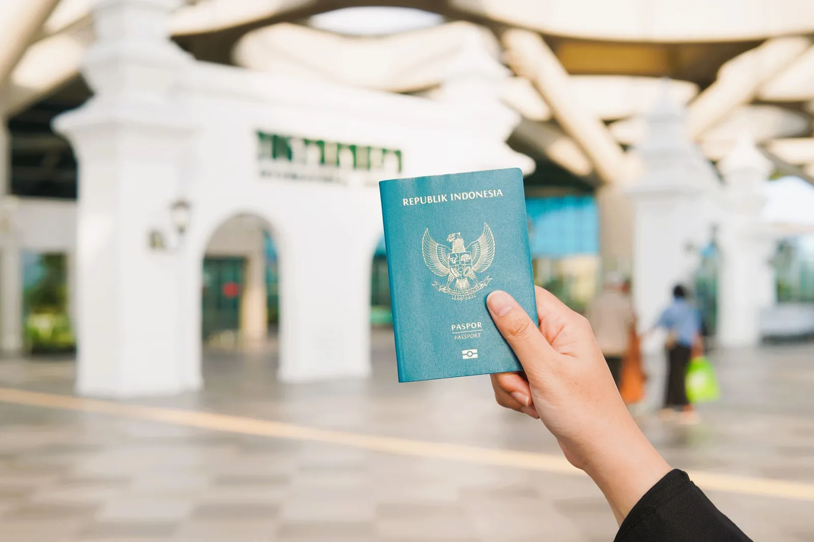 Traveler checking a map and itinerary before boarding an international flight