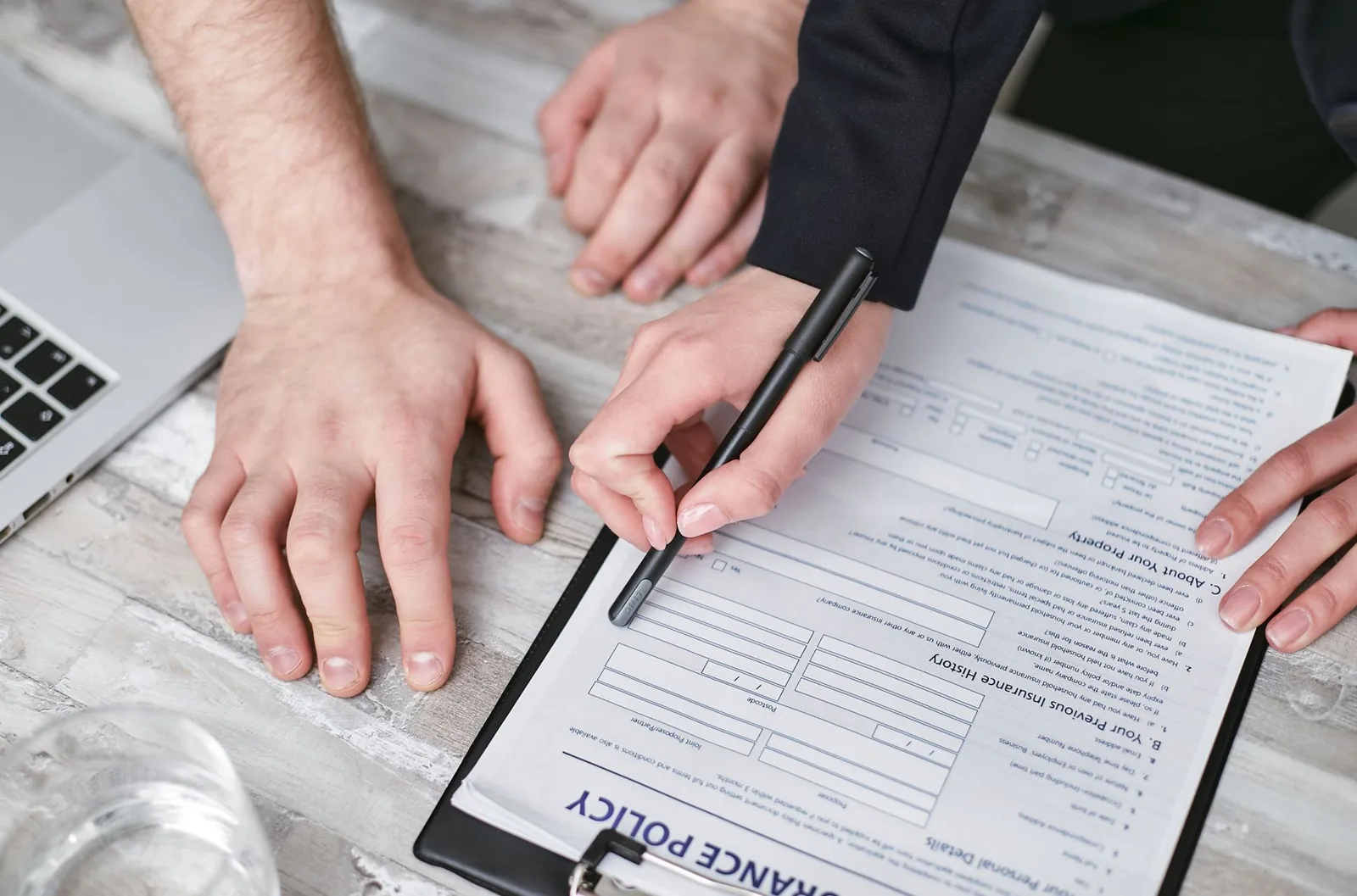 Travelers reviewing an insurance quote before a trip