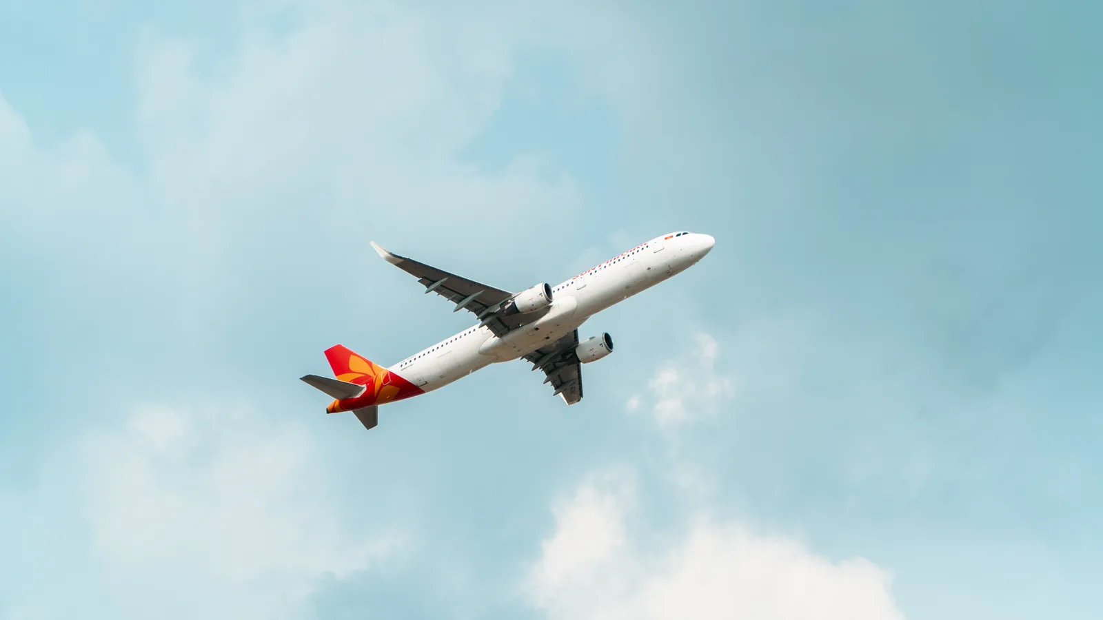Traveler reviewing flight refund rules before canceling a booking
